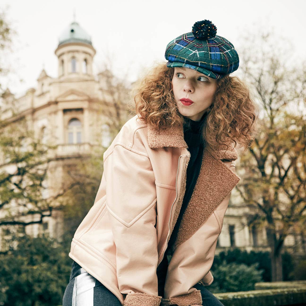 flat cap with pom pom